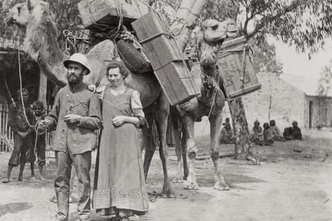 Pastor and Mrs O Liebler with two pack camels