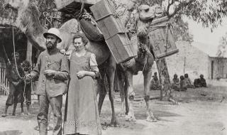 Pastor and Mrs O Liebler with two pack camels