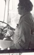 Gus Williams driving bus